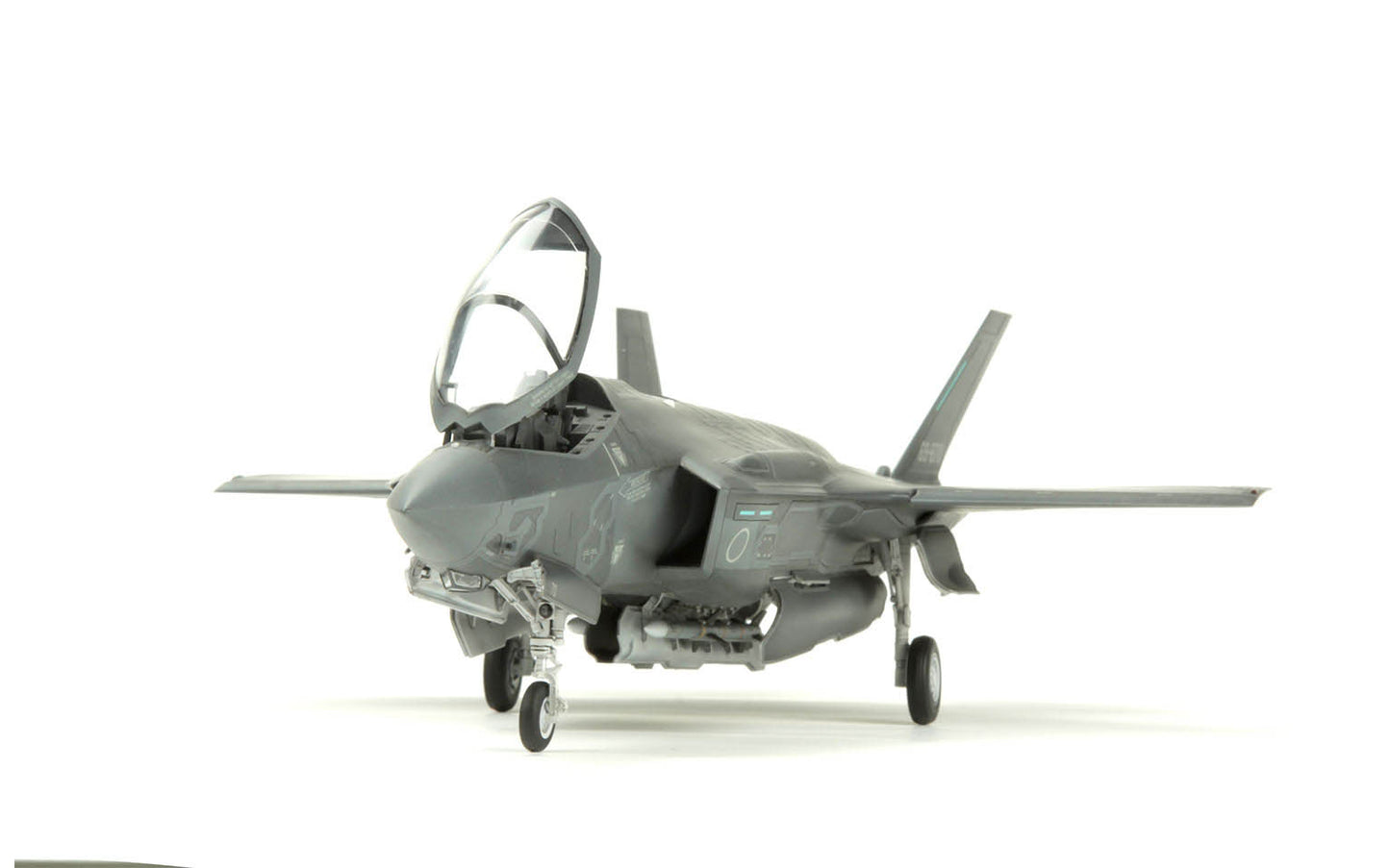 Model of a fighter jet on a white background