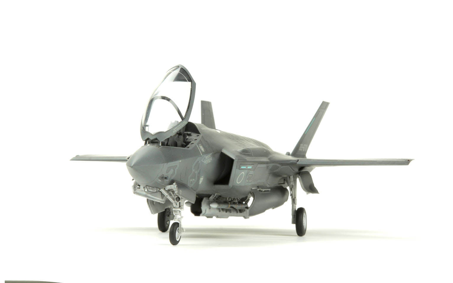 Model of a fighter jet on a white background