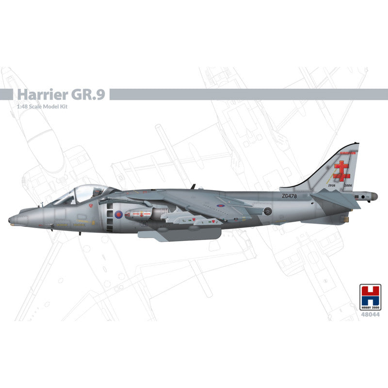 Model kit of a Harrier GR.9 aircraft on a white background with a grid pattern
