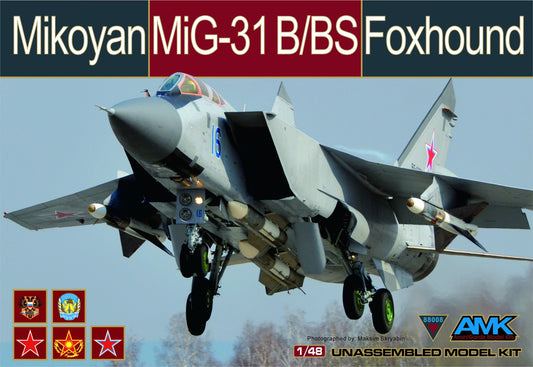Mikoyan MiG-31 B/BS Foxhound model kit packaging with a jet in flight on a blue sky background.